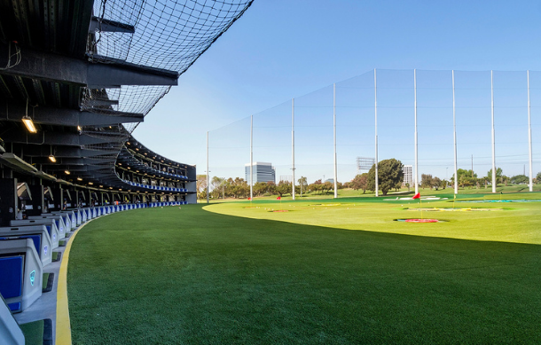 TopGolf El Segundo bays and targets in grass w fence