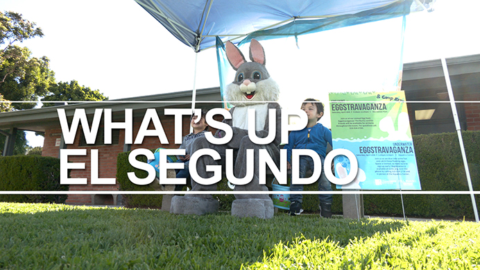 Egg Hunt Eggstravaganza Whats Up El Segundo easter bunny and child in grass