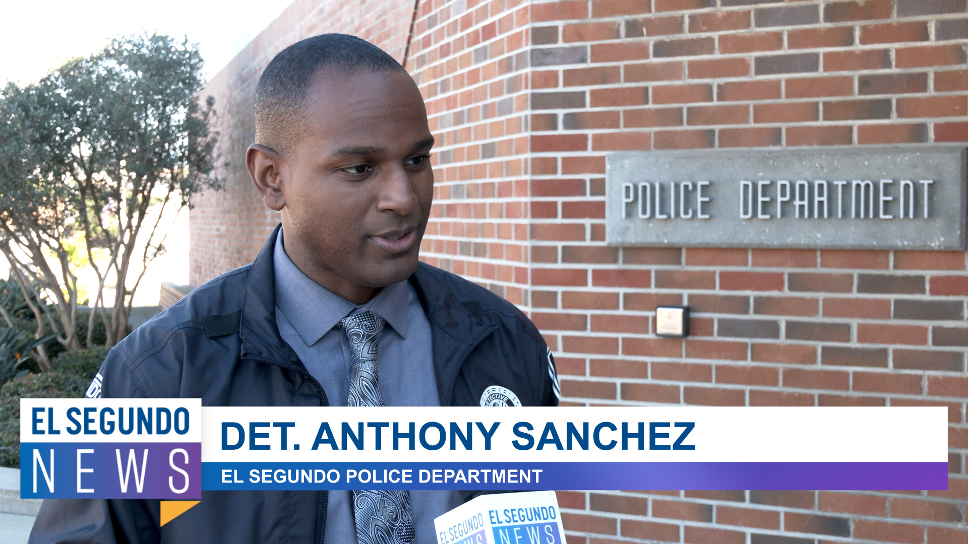 Police Officer interviewed in front of PD