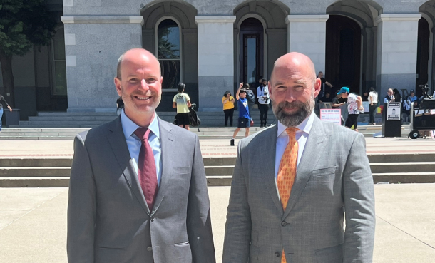 Mayor Pro Tem Chris Pimentel and Councilmember Ryan Baldino standing in front of the State Capito