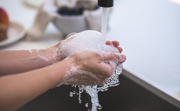 Person Washing His Hand